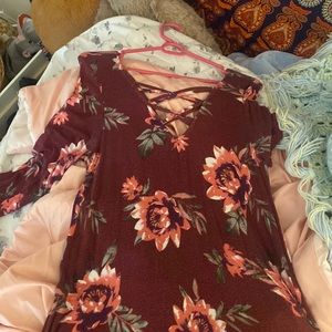 A maroon flowered dress